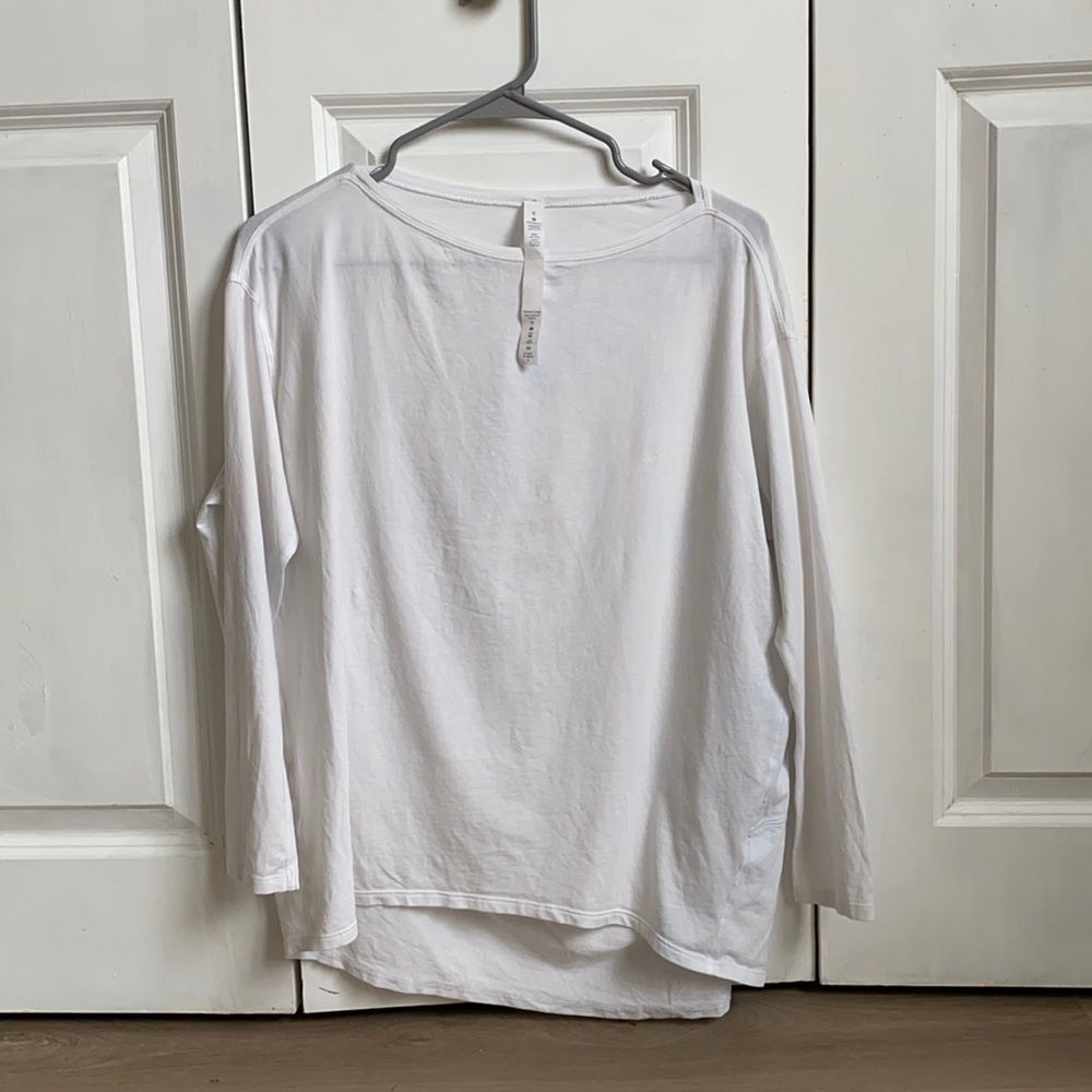 White Lululemon long sleeve. Worn once and washed
